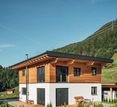 Inserat Holzhäuserbau  mit Flachdach 