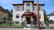 Inserat Mehrfamilienhaus mit Pool, Garage und Garten zu verkaufen